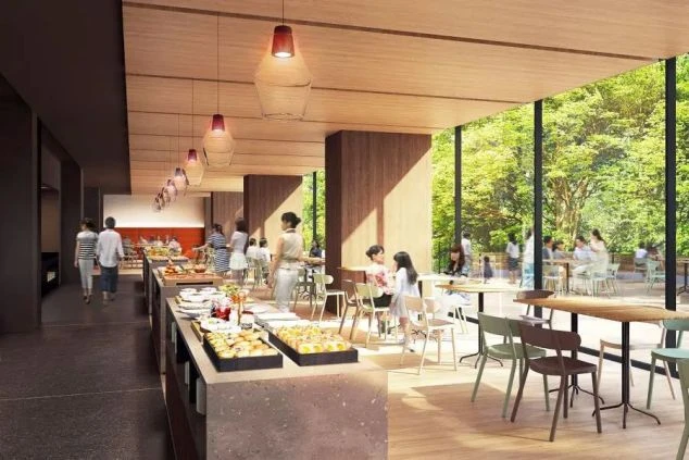 緑豊かな景色を望む明るいビュッフェレストラン。リゾートバイトで、お客様の笑顔と美味しい食事をサポートする仕事。