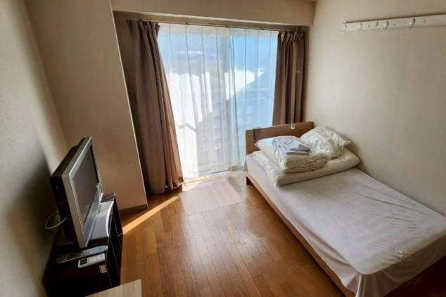 リゾートバイトの個室寮の寝室の画像